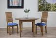 Table ronde à volets réalisée en Chêne Massif de style Louis Philippe Diamètre 110 + 2 allonges de 40 cm Table ronde à volets diam.110 Table ronde à volets réalisée en Chêne Massif de style Louis Philippe Diamètre 110 + 2 allonges de 40 cm Table ronde à volets diam.110